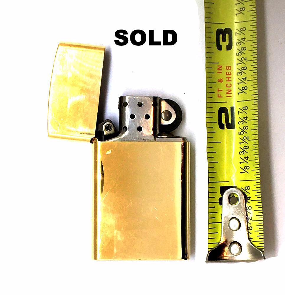 Gold Zippo Lighter –– Tiffany & Co.